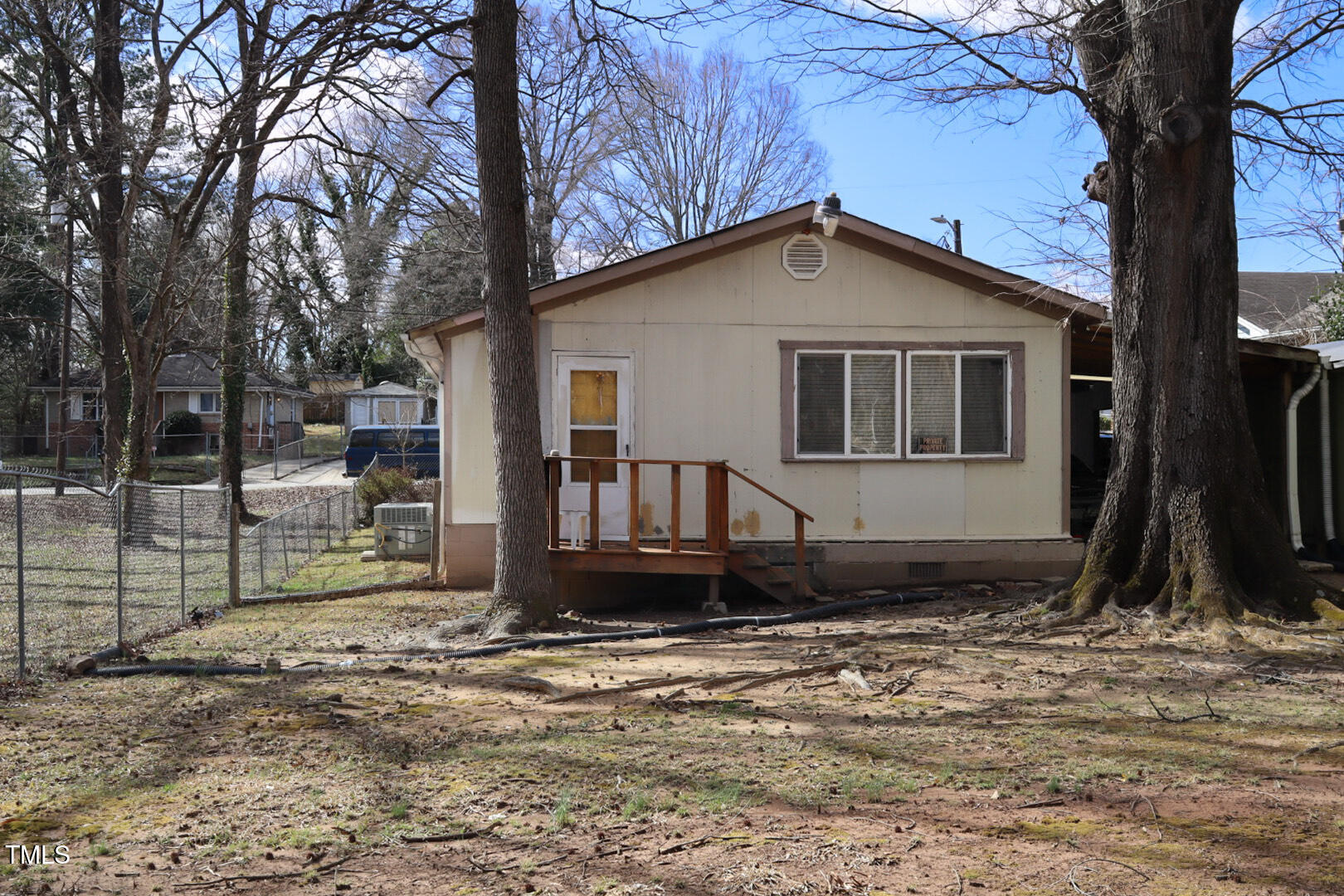 309 Cody Street Durham, NC 27703 - Photo 6 of 22 a front view of a house with a yard