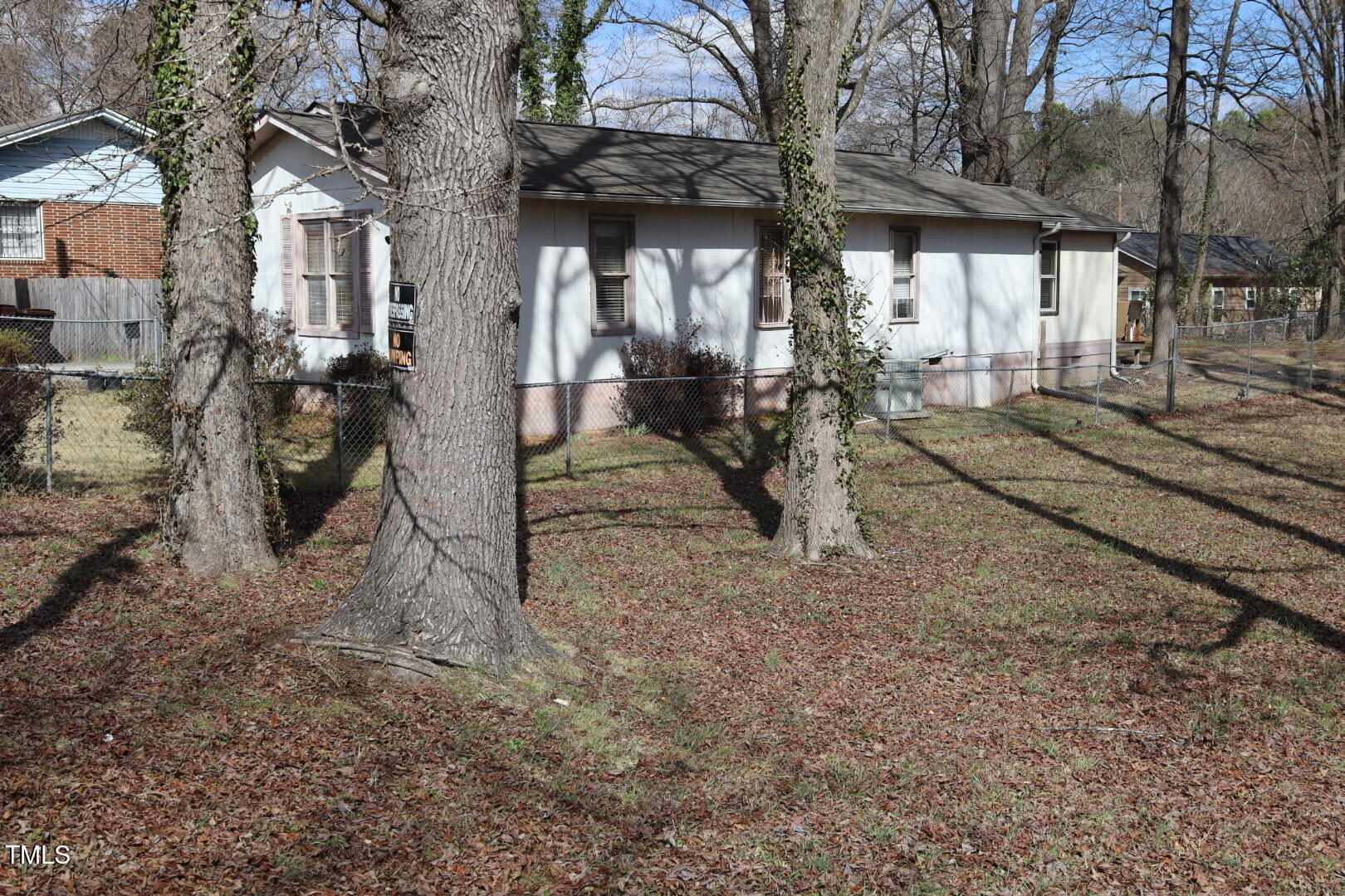 309 Cody Street Durham, NC 27703 - Photo 7 of 22 a view of a house with a small yard