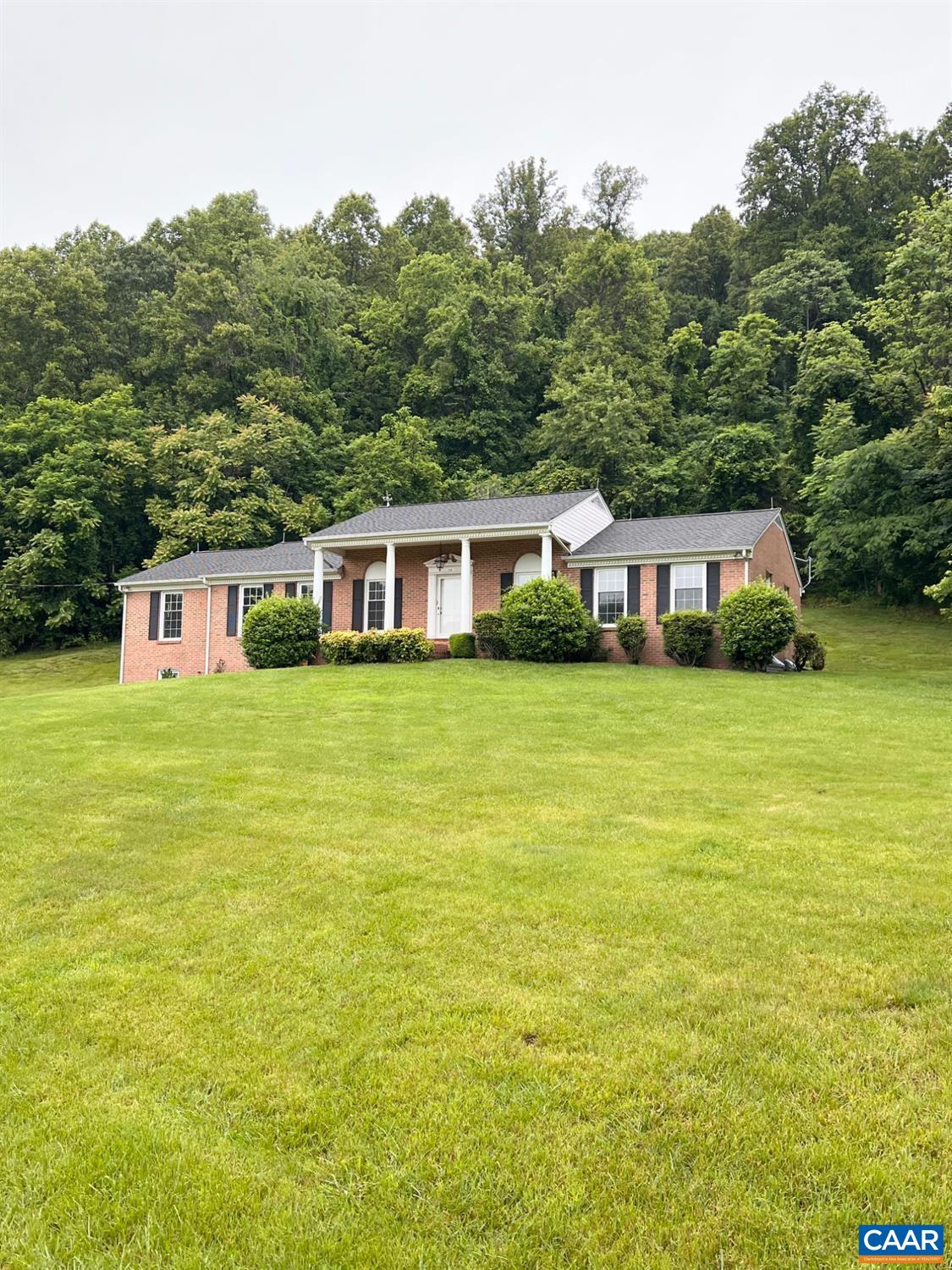 a house view with a garden space