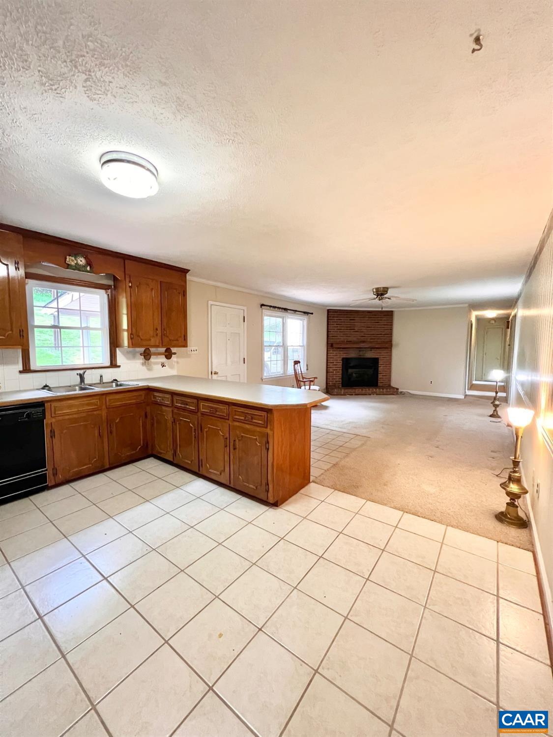 166 Matohe Road Monroe, VA 24574 - Photo 4 of 12 a large kitchen with a cabinets and sink
