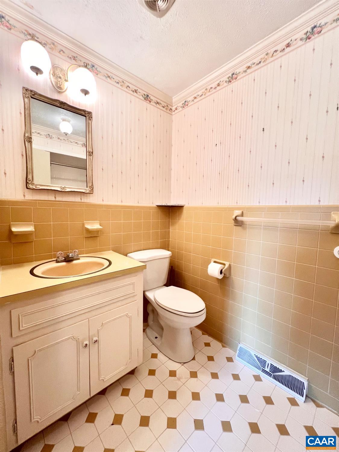 166 Matohe Road Monroe, VA 24574 - Photo 5 of 12 a bathroom with a sink a toilet and shower