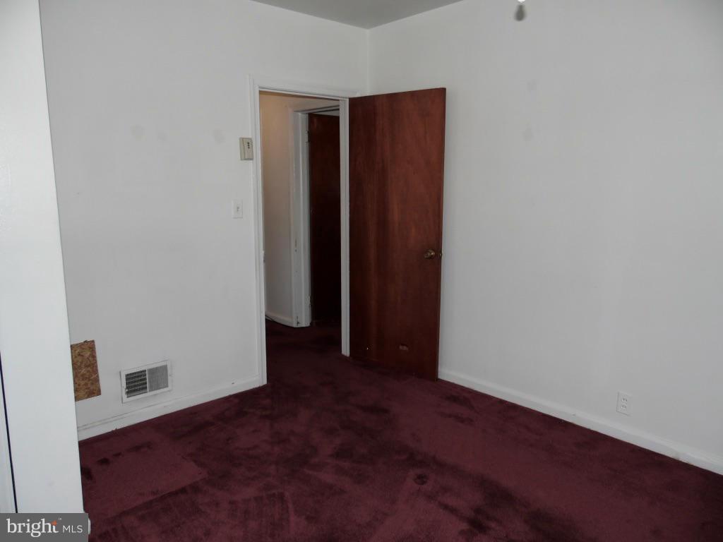 11245 Old Frederick Road Marriottsville, MD 21104 - Photo 13 of 22 an empty room with closet