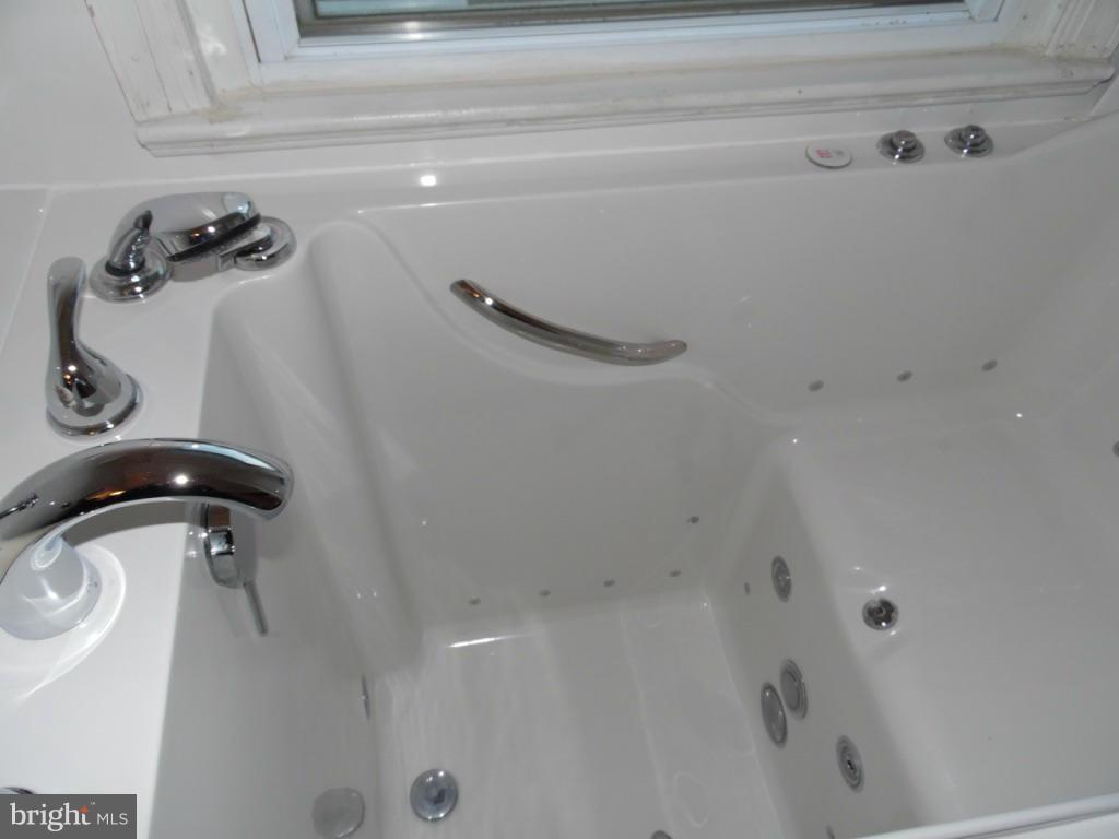 11245 Old Frederick Road Marriottsville, MD 21104 - Photo 14 of 22 a bathroom with a shower