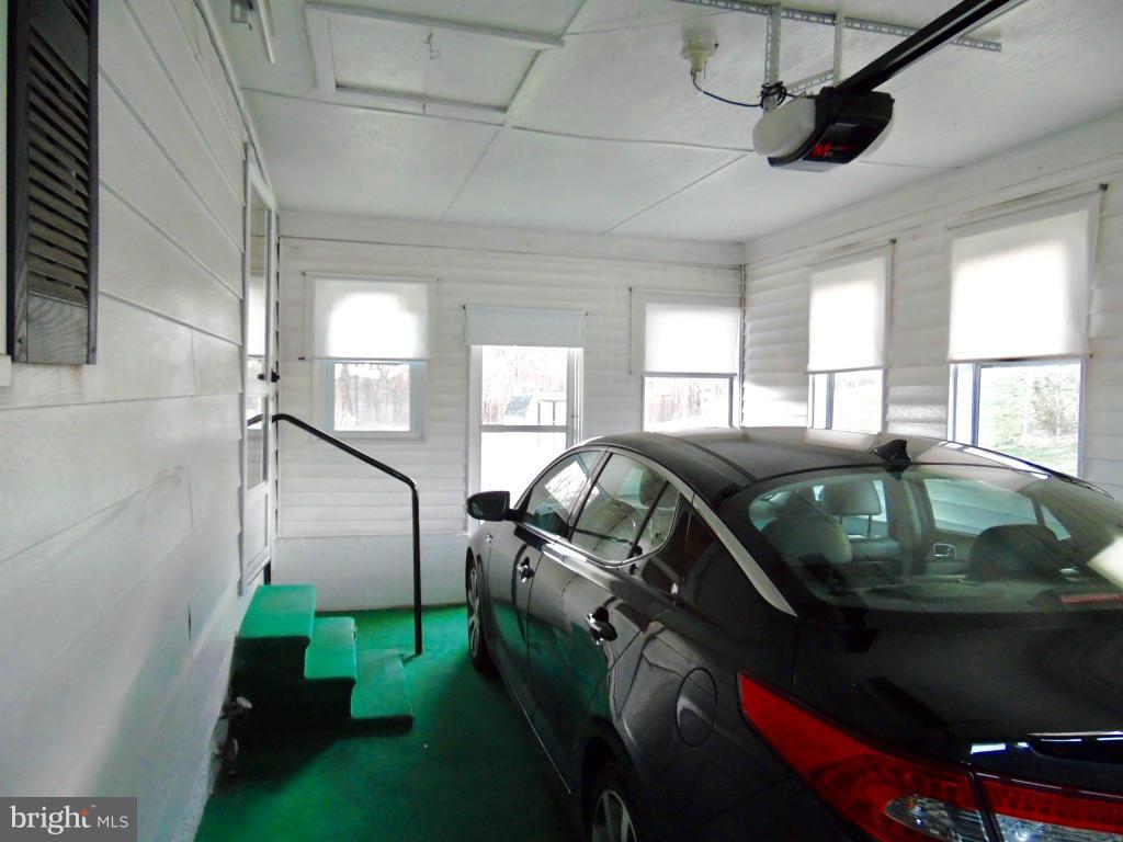 11245 Old Frederick Road Marriottsville, MD 21104 - Photo 17 of 22 a bedroom with furniture and a window