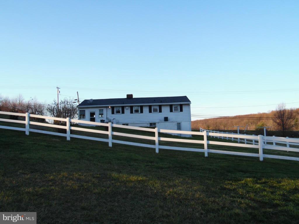 11245 Old Frederick Road Marriottsville, MD 21104 - Photo 18 of 22 a view of a bench in a field