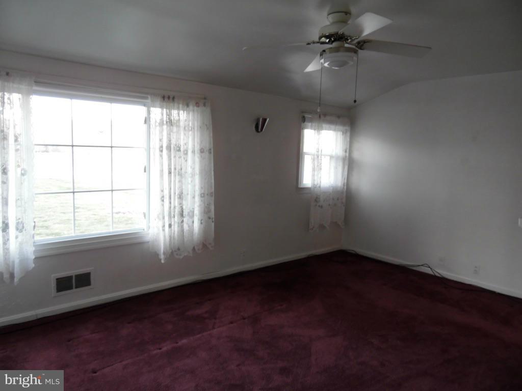 11245 Old Frederick Road Marriottsville, MD 21104 - Photo 3 of 22 an empty room with a window