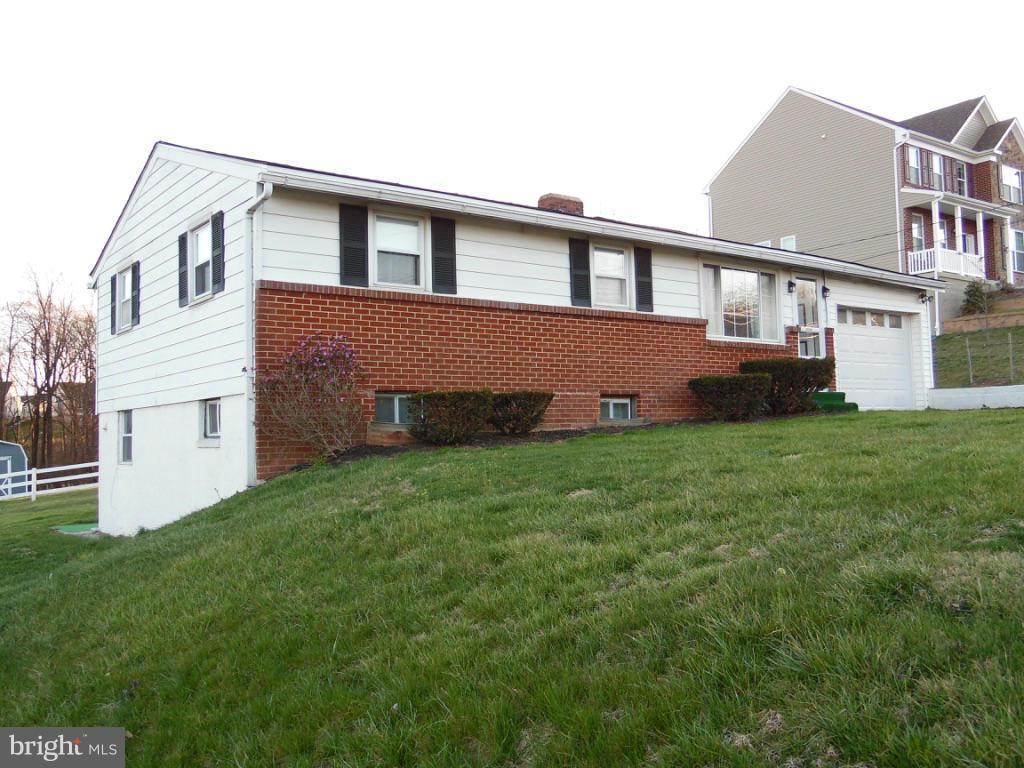 11245 Old Frederick Road Marriottsville, MD 21104 - Photo 22 of 22 a front view of a house with a yard