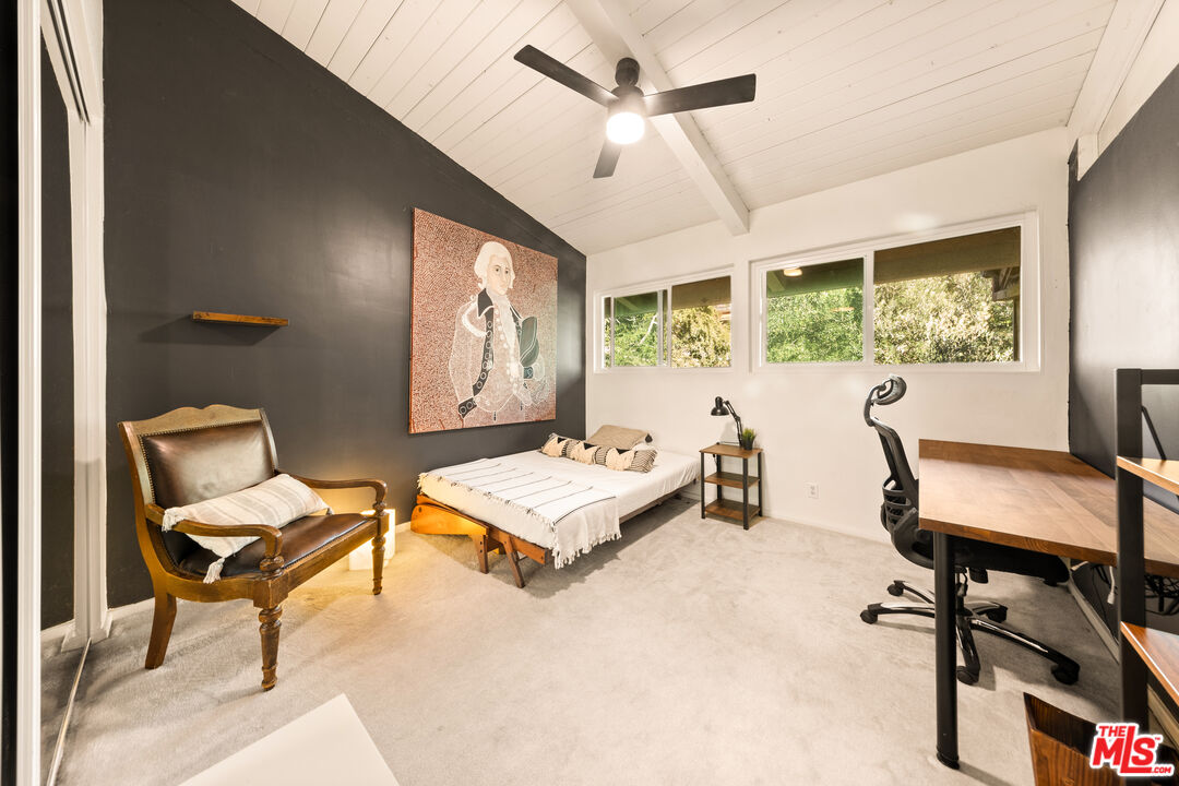6425 Green Valley Circle, Unit 302 Culver City, CA 90230 - Photo 25 of 34 a living room with furniture a large window and furniture