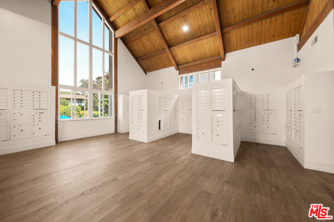 6425 Green Valley Circle, Unit 302 Culver City, CA 90230 - Photo 31 of 34 an empty room with windows