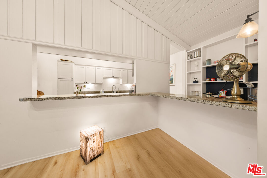 6425 Green Valley Circle, Unit 302 Culver City, CA 90230 - Photo 7 of 34 a kitchen with a sink and cabinets