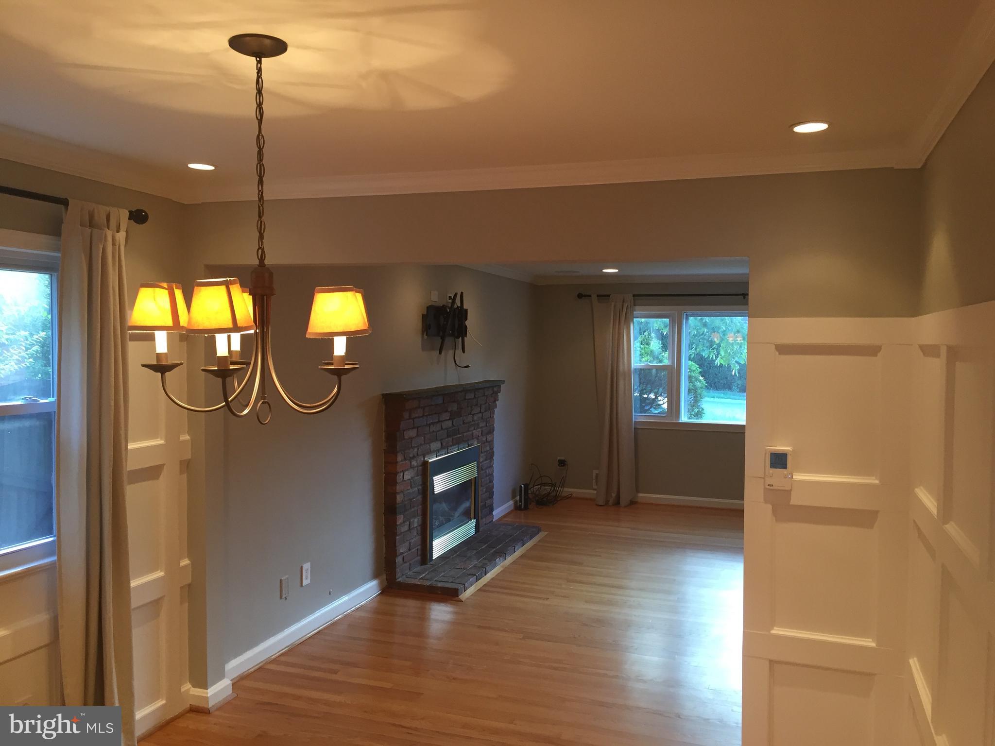3717 North Glebe Road Arlington, VA 22207 - Photo 13 of 26 a living room with furniture and a fireplace