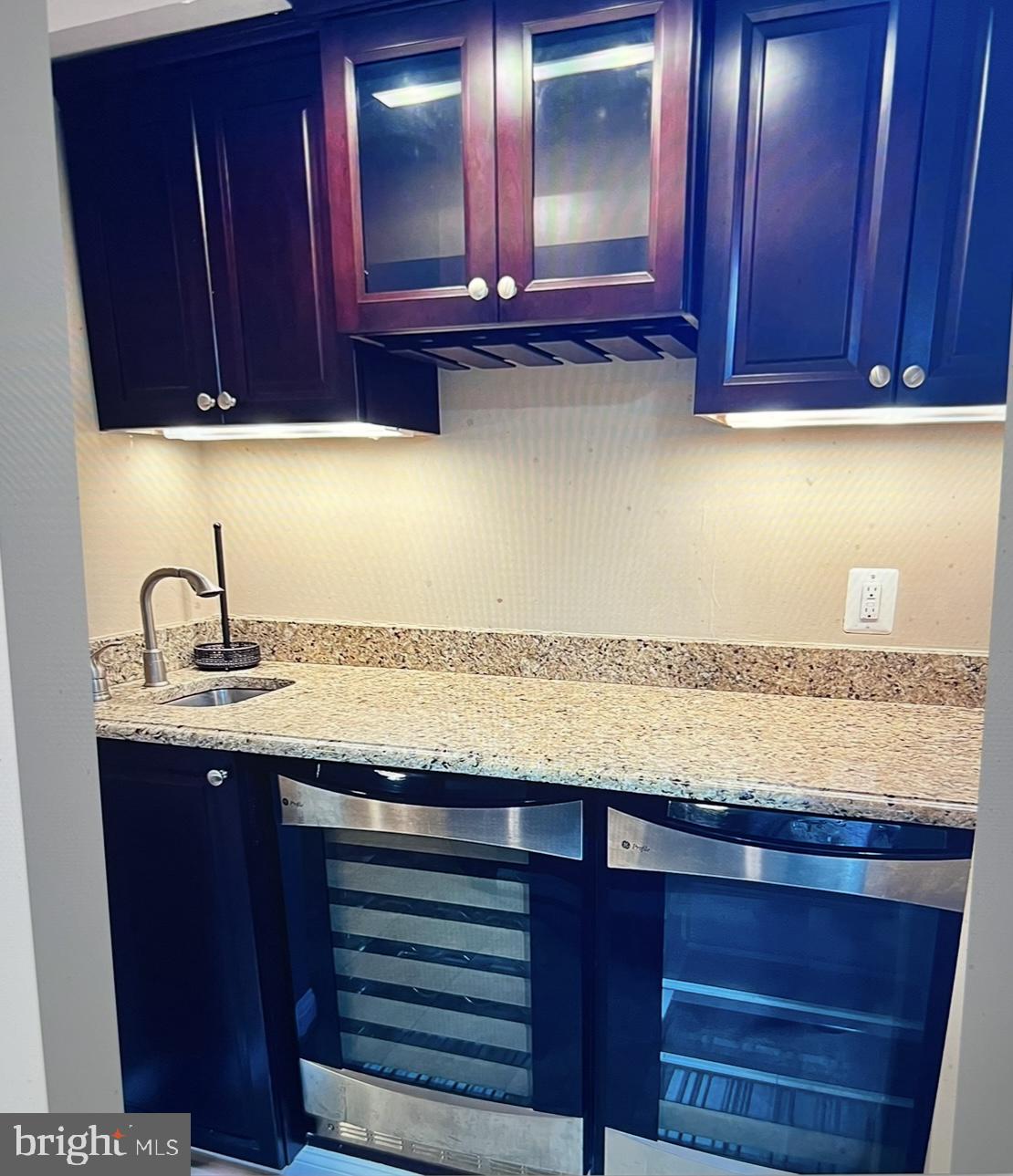 3717 North Glebe Road Arlington, VA 22207 - Photo 19 of 26 a view of cabinets with wooden floor