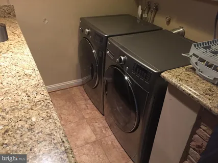 a room with two washing machine
