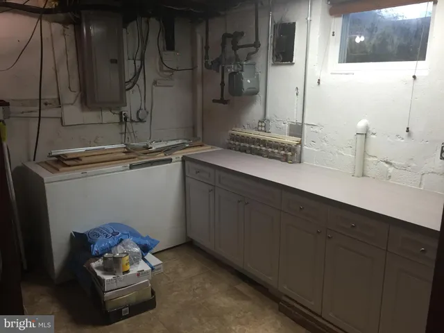 a bathroom with a sink and mirror