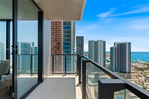 a view of balcony with a tall building