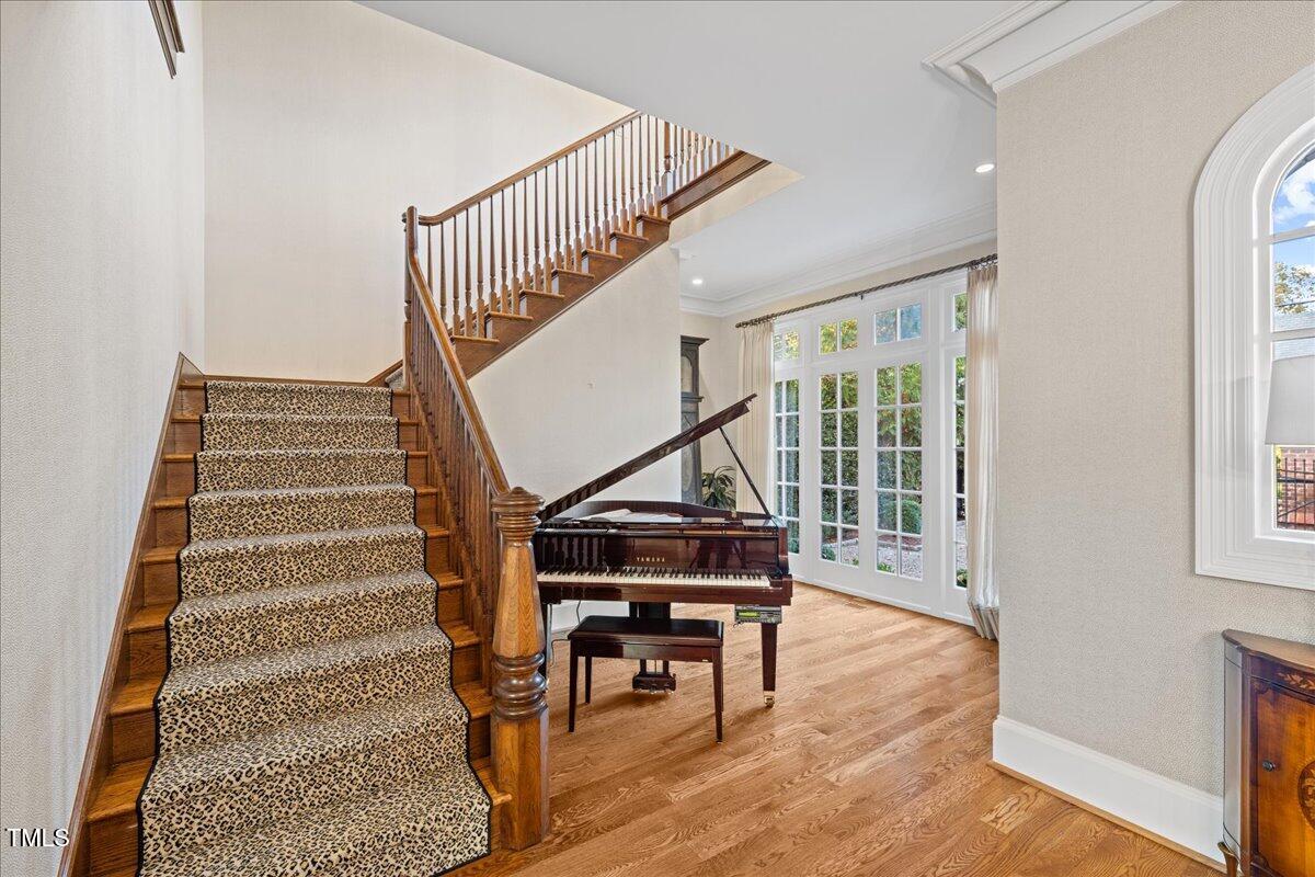 2627 Fairview Road Raleigh, NC 27608 - Photo 14 of 55 Grand staircase with area for your baby grand piano