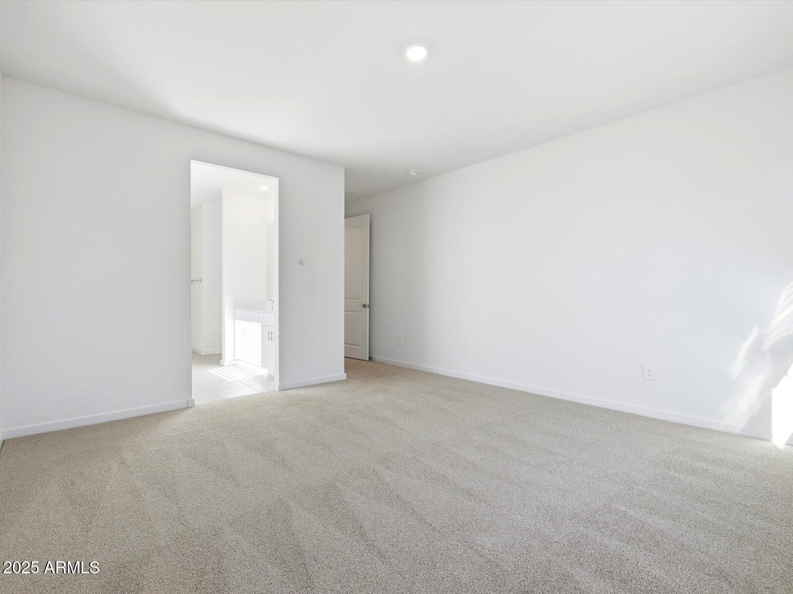 24477 West Grove Street Buckeye, AZ 85326 - Photo 13 of 49 a view of an empty room