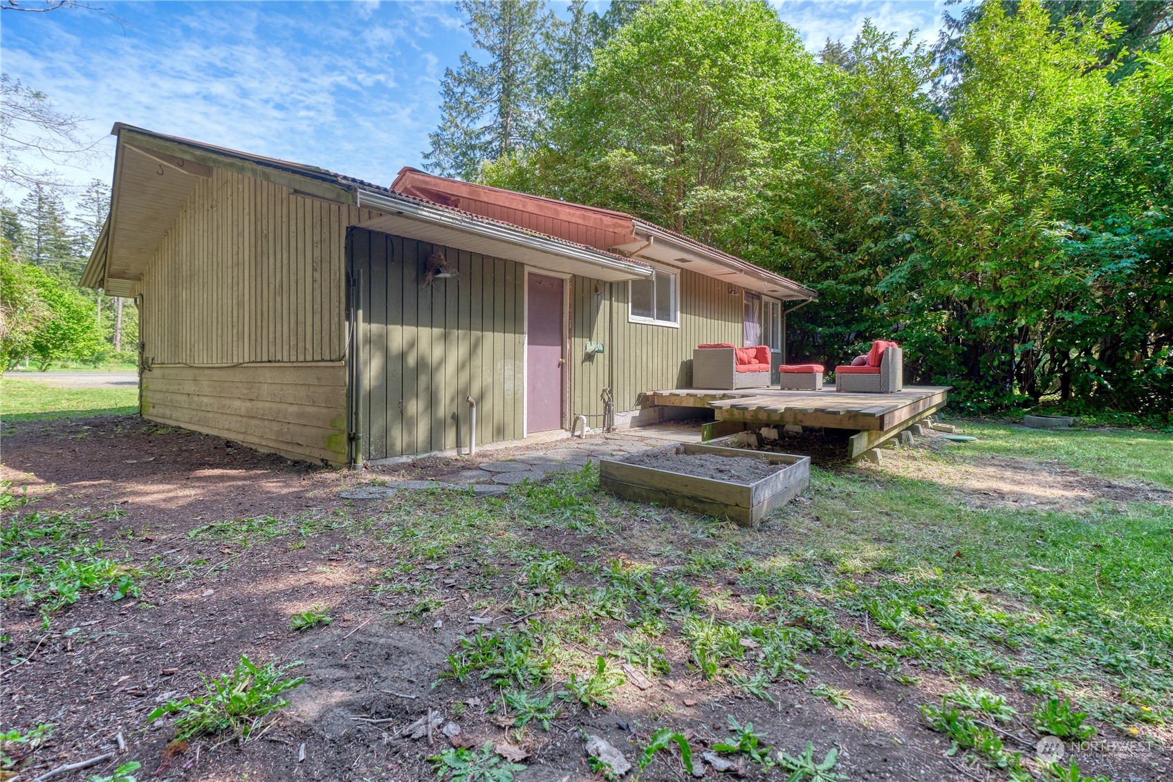 323 Mill Road Point Roberts, WA 98281 - Photo 18 of 26 a backyard of a house with yard and outdoor seating