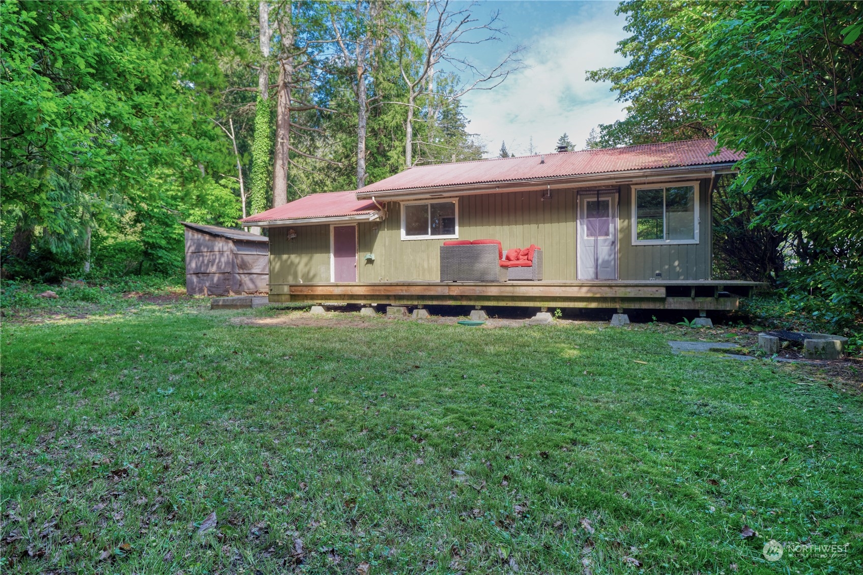 323 Mill Road Point Roberts, WA 98281 - Photo 20 of 26 a front view of a house with a yard