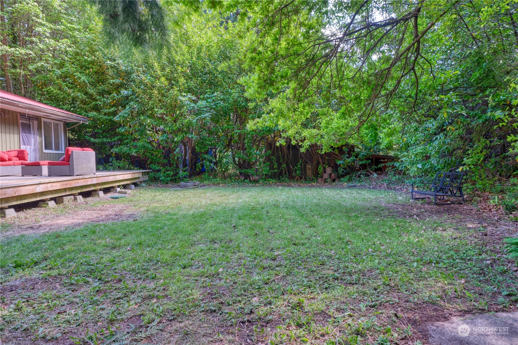 323 Mill Road Point Roberts, WA 98281 - Photo 22 of 26 a view of backyard with a barn