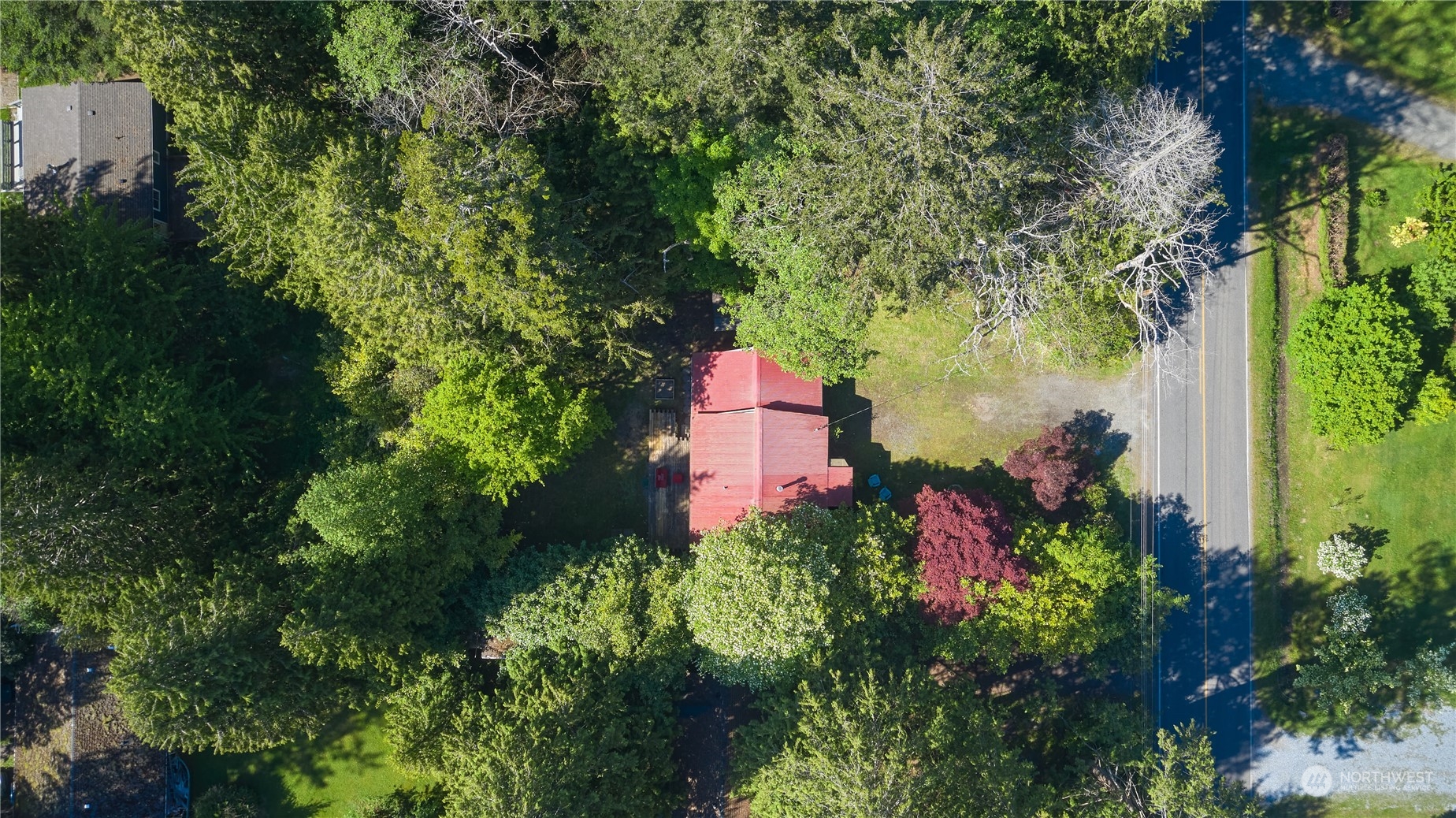 323 Mill Road Point Roberts, WA 98281 - Photo 25 of 26 an aerial view of a house with a yard and garden