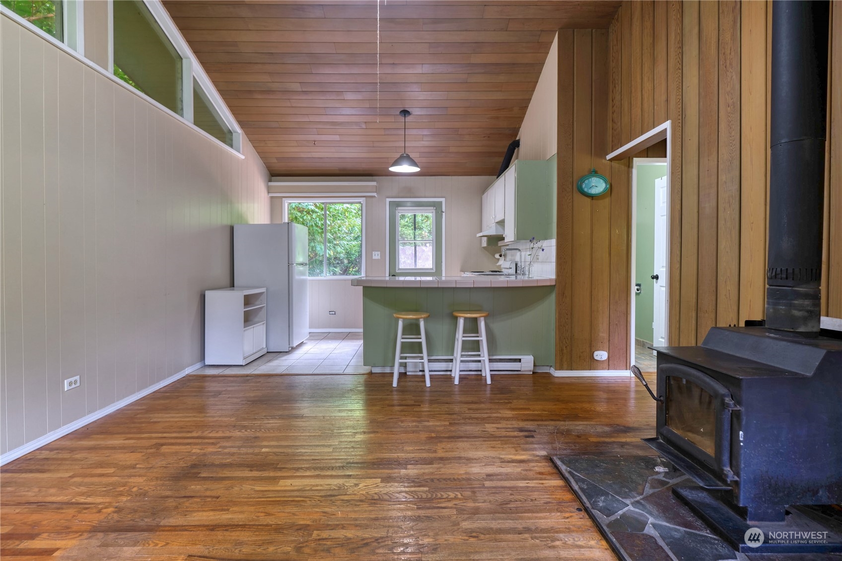 323 Mill Road Point Roberts, WA 98281 - Photo 3 of 26 a view of a dining room with furniture window and wooden floor