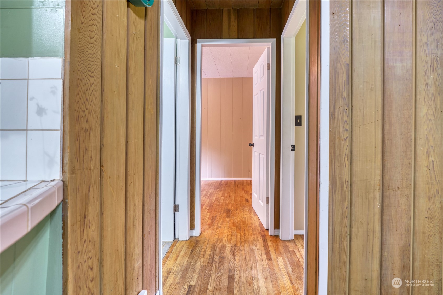 323 Mill Road Point Roberts, WA 98281 - Photo 9 of 26 a view of a bathroom from a hallway