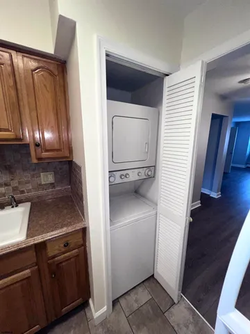a view of a kitchen from the hallway
