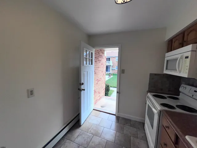 a view of kitchen and utility room