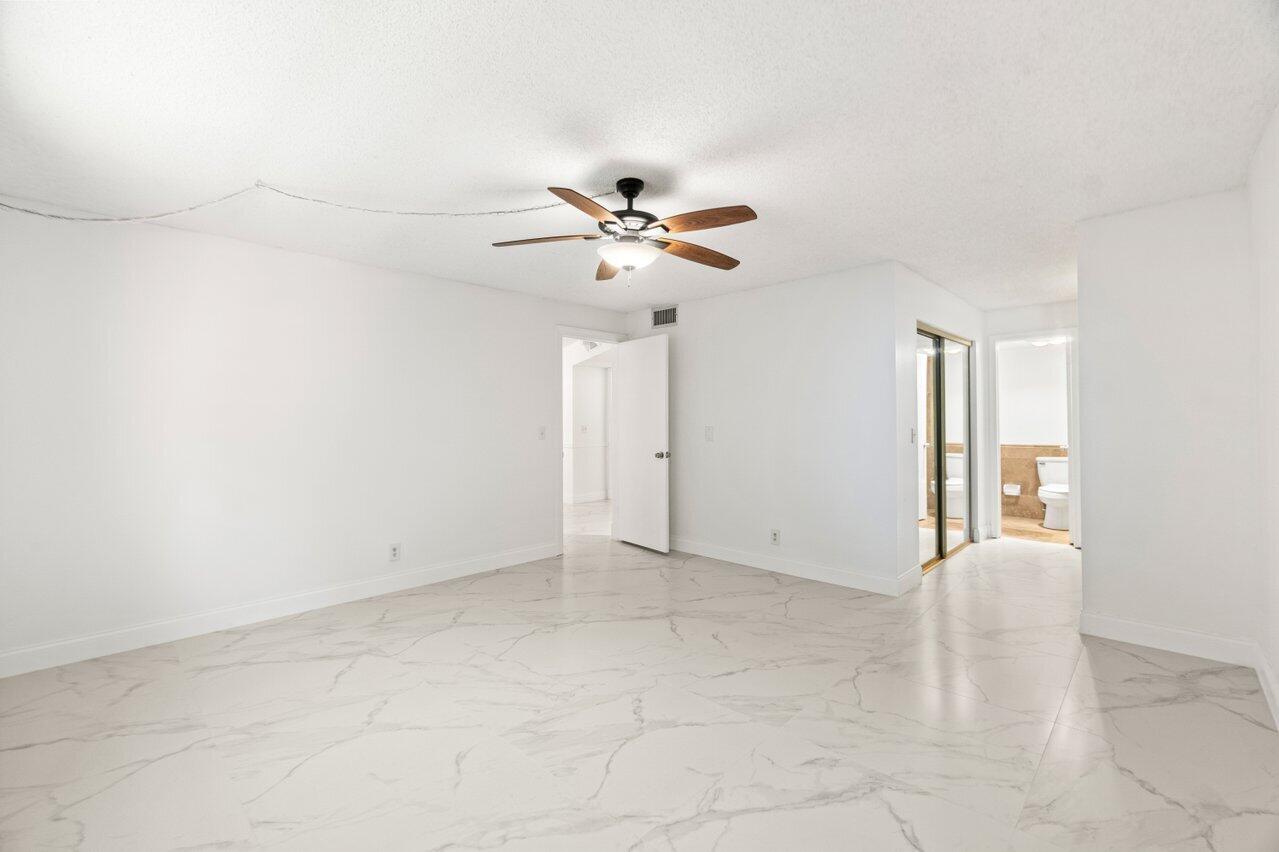 22615 Southwest 66th Avenue, Unit 310 Boca Raton, FL 33428 - Photo 11 of 28 Primary Bedroom