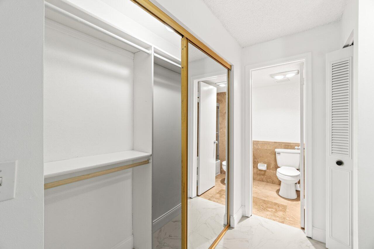22615 Southwest 66th Avenue, Unit 310 Boca Raton, FL 33428 - Photo 12 of 28 Primary Closet