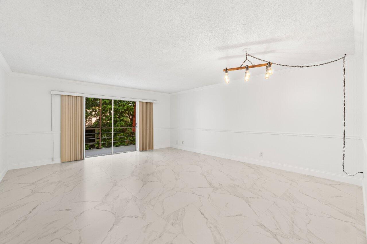 22615 Southwest 66th Avenue, Unit 310 Boca Raton, FL 33428 - Photo 2 of 28 Living Room