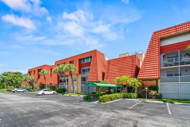 a view of a street with cars