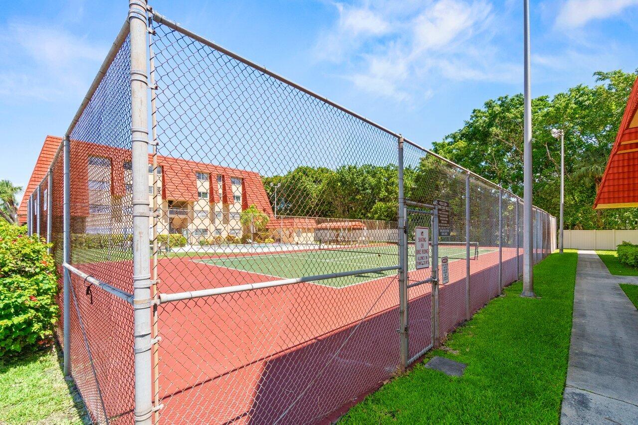 22615 Southwest 66th Avenue, Unit 310 Boca Raton, FL 33428 - Photo 27 of 28 Tennis Court