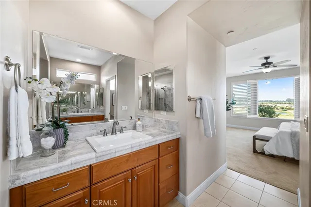 a kitchen with a sink cabinets and window