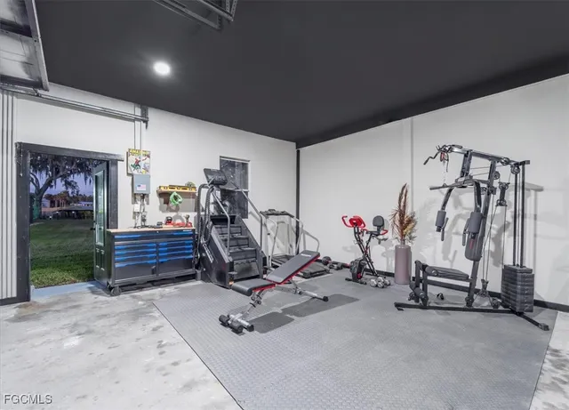 a view of a balcony with wooden chairs and floor to ceiling window and wooden fence