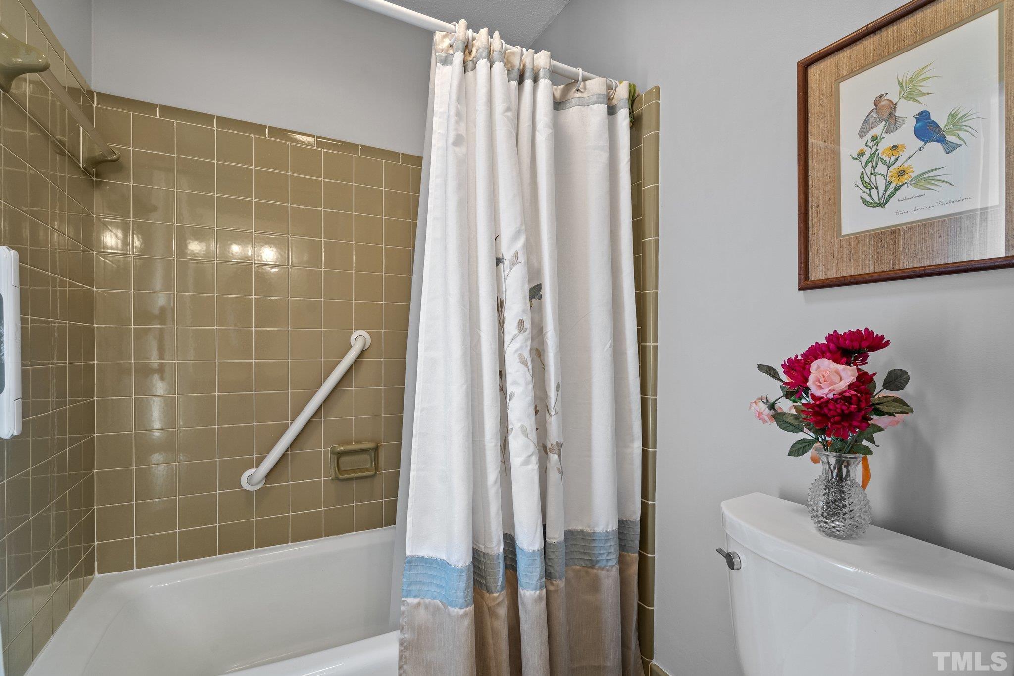 7805 Harps Mill Road Raleigh, NC 27615 - Photo 37 of 57 a bathroom with a shower