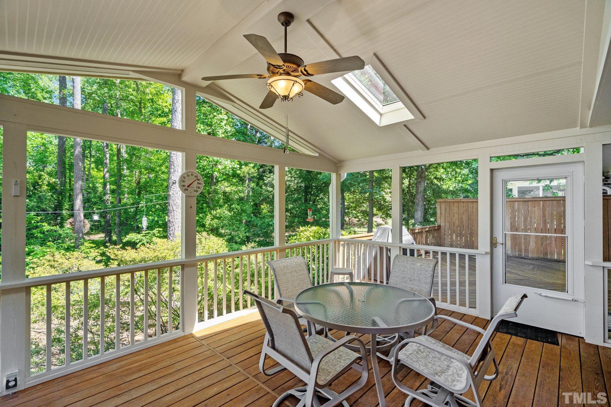 7805 Harps Mill Road Raleigh, NC 27615 - Photo 45 of 57 a view of a dining room with furniture window and outside view