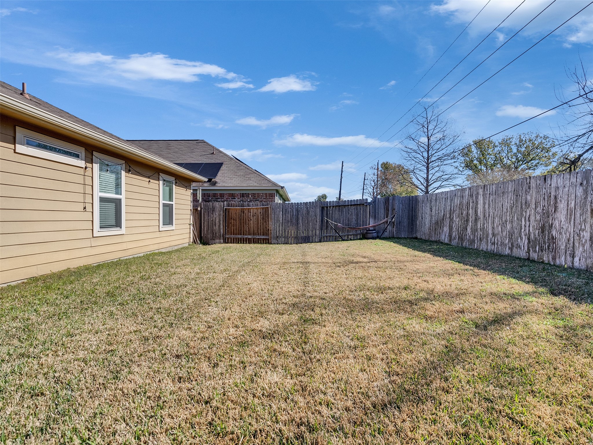 20043 Sunshine Ridge Lane Cypress, TX 77429 - Photo 14 of 16 a view of a backyard