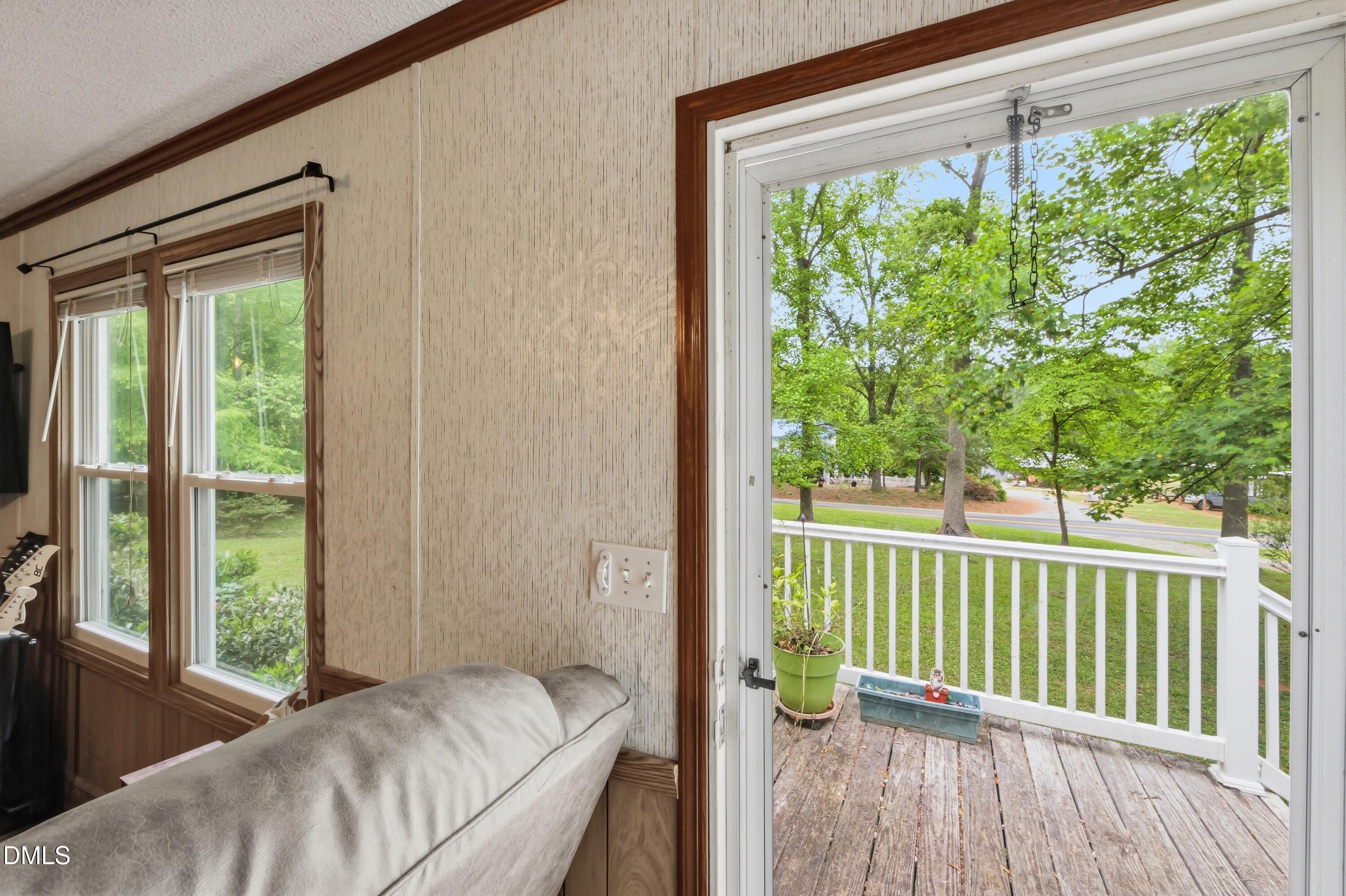1512 Red Mountain Road Rougemont, NC 27572 - Photo 26 of 50 a view of a porch with a yard