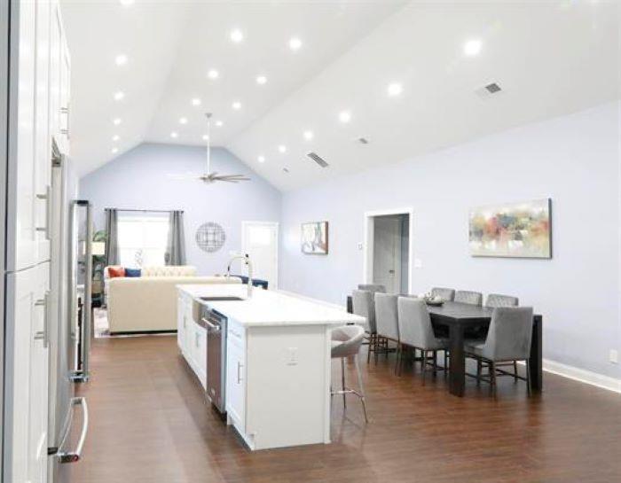 1673 Fairway Drive Mableton, GA 30126 - Photo 11 of 27 a view of a dining room with furniture and chandelier