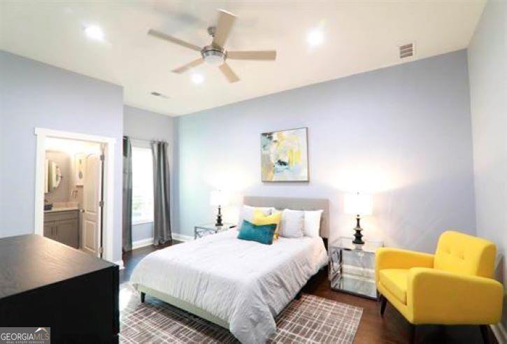 1673 Fairway Drive Mableton, GA 30126 - Photo 16 of 27 a bedroom with a bed a couch and a dresser