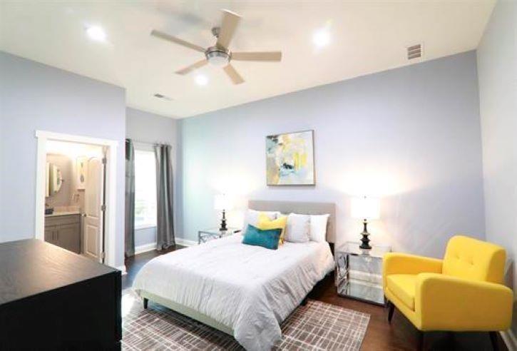 1673 Fairway Drive Mableton, GA 30126 - Photo 19 of 27 a bedroom with a bed a couch and a dresser