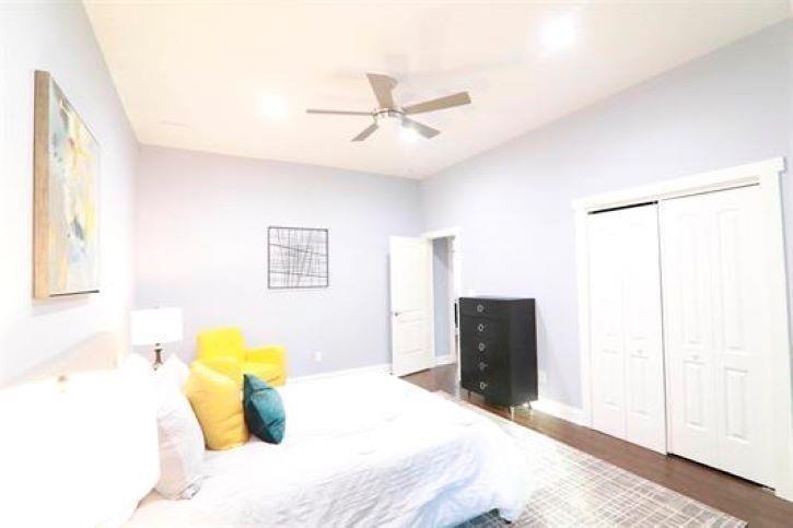 1673 Fairway Drive Mableton, GA 30126 - Photo 20 of 27 a bedroom with a bed and wooden floor