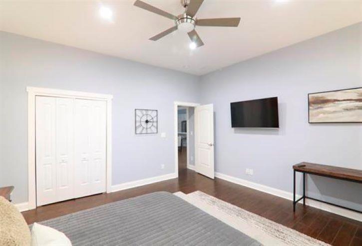 1673 Fairway Drive Mableton, GA 30126 - Photo 22 of 27 a bedroom with a bed and a flat screen tv