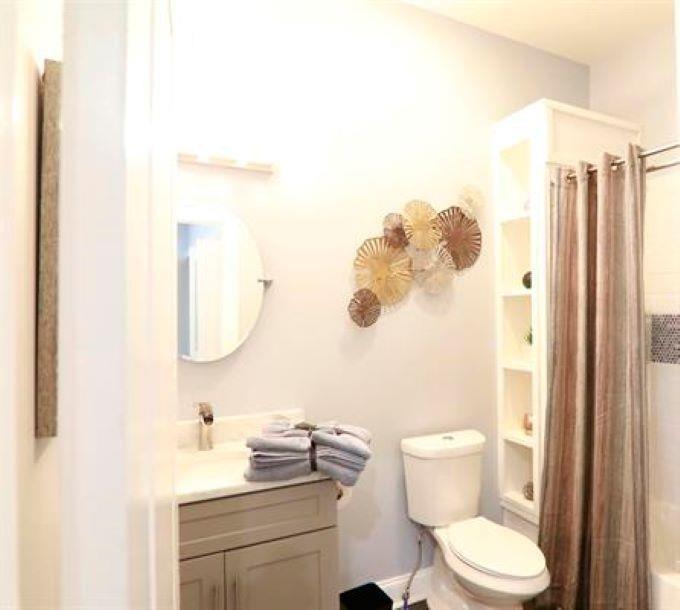 1673 Fairway Drive Mableton, GA 30126 - Photo 24 of 27 a bathroom with a granite countertop sink mirror vanity and toilet