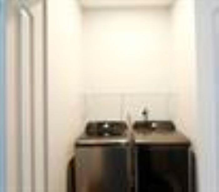 1673 Fairway Drive Mableton, GA 30126 - Photo 27 of 27 a kitchen with a sink and cabinets