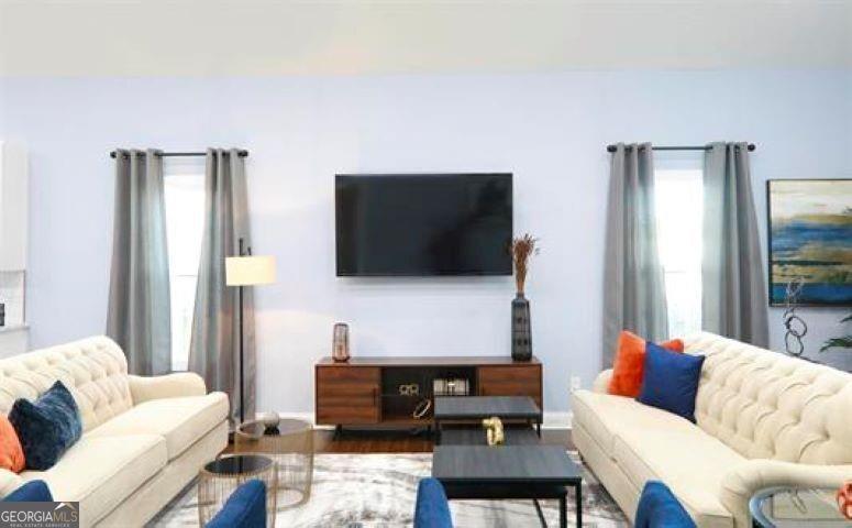 1673 Fairway Drive Mableton, GA 30126 - Photo 4 of 27 a living room with furniture and a flat screen tv