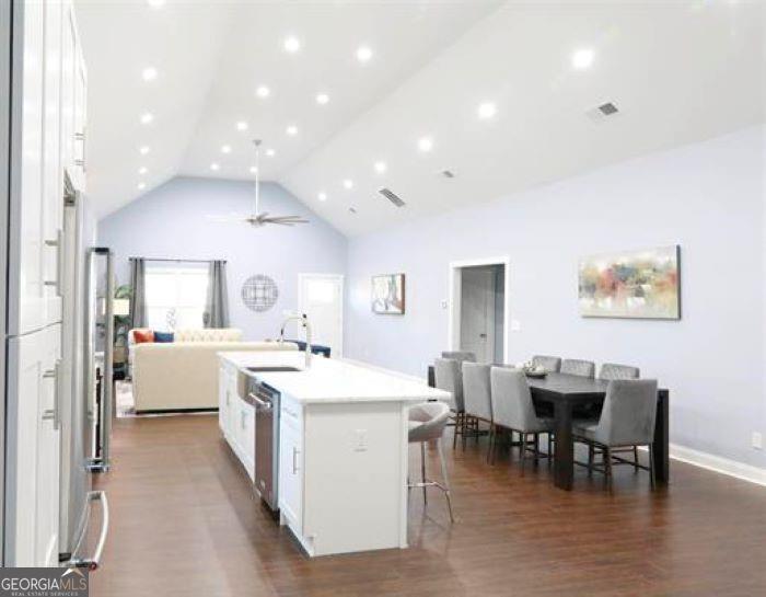 1673 Fairway Drive Mableton, GA 30126 - Photo 7 of 27 a view of a dining room with furniture and chandelier