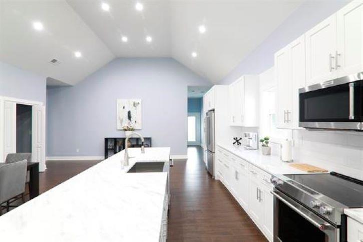 1673 Fairway Drive Mableton, GA 30126 - Photo 9 of 27 a large white kitchen with a large window